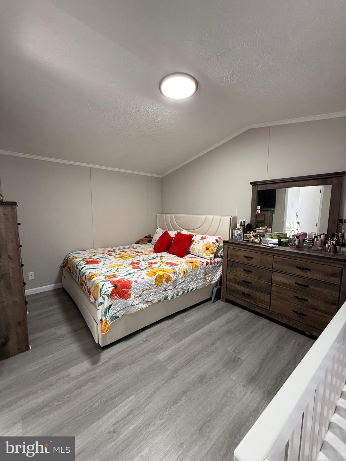 7959 Telegraph Road Severn, MD 21144 - Photo 15 of 18 a bedroom with a bed and a window