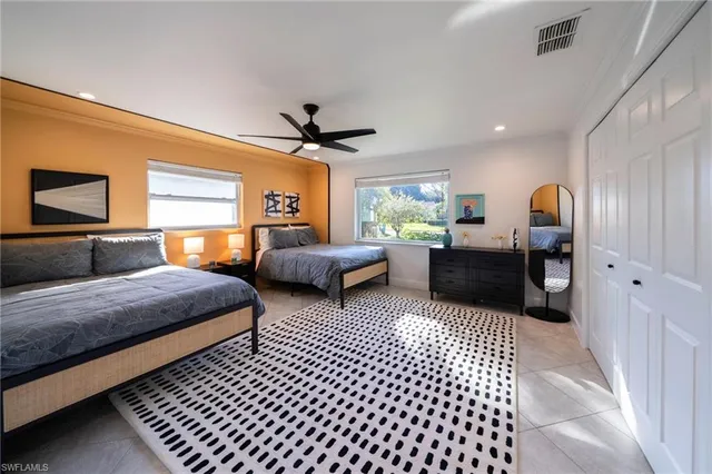 a bedroom with furniture and a bed