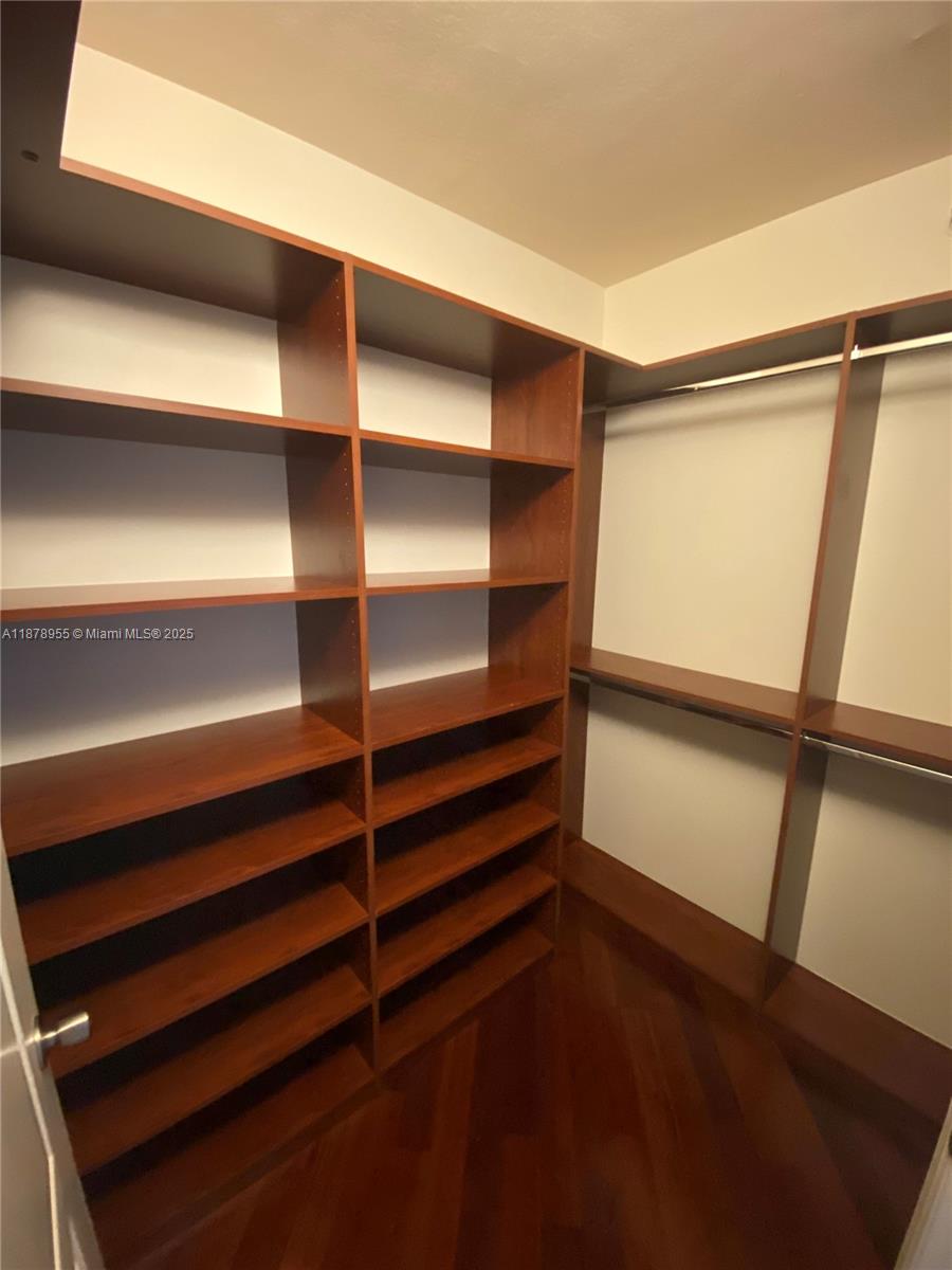 110 North Federal Highway, Unit 705 Fort Lauderdale, FL 33301 - Photo 7 of 16 a view of walk in closet with empty racks