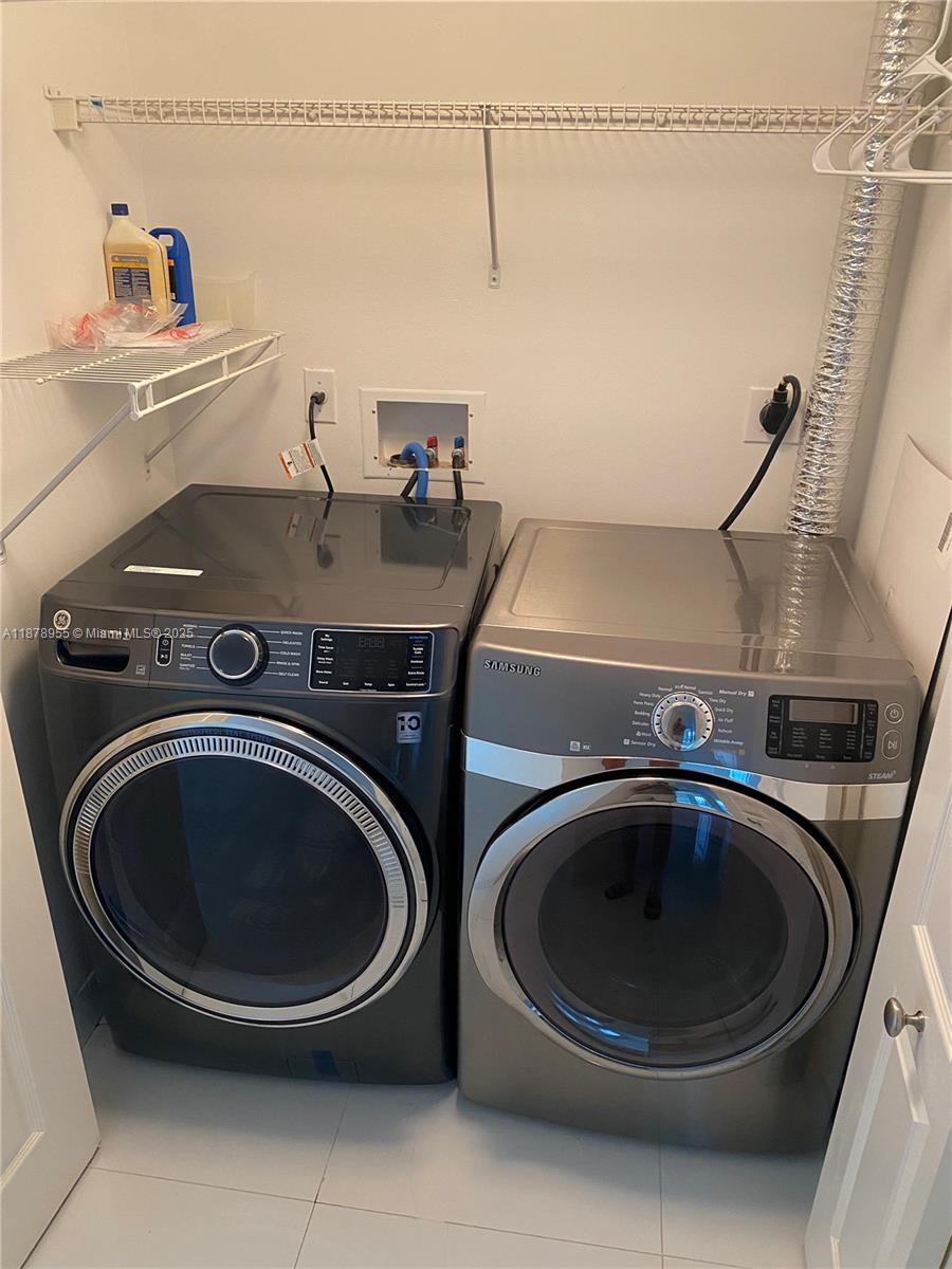 110 North Federal Highway, Unit 705 Fort Lauderdale, FL 33301 - Photo 10 of 16 a utility room with dryer and washer