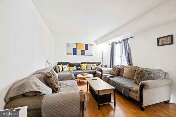 a living room with furniture and a couch