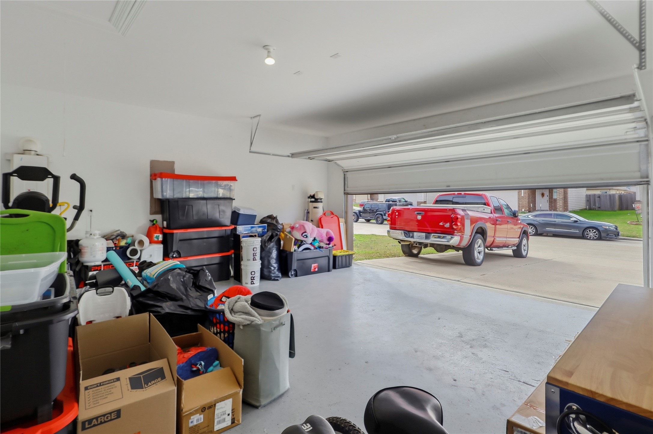 9938 Yanet Grove Lane Houston, TX 77044 - Photo 21 of 21 a view of a garage with stuff