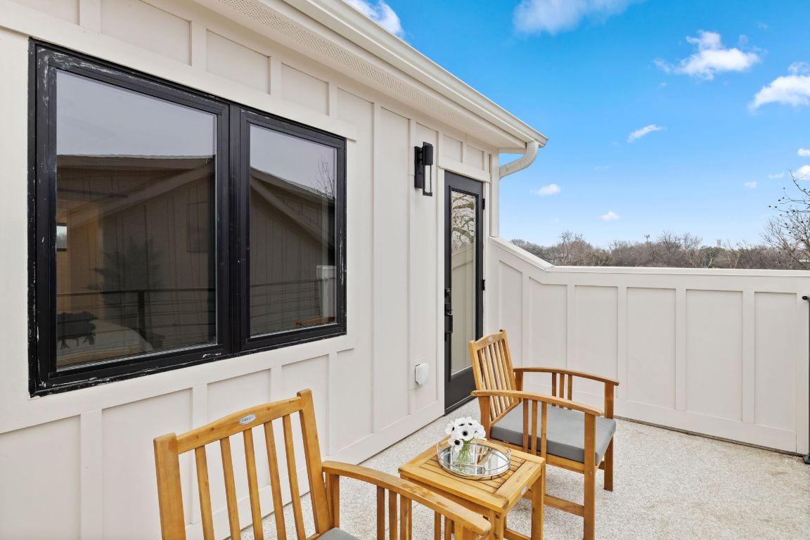 4710 Clarkson Avenue Austin, TX 78751 - Photo 13 of 14 a view of a balcony with furniture and city view
