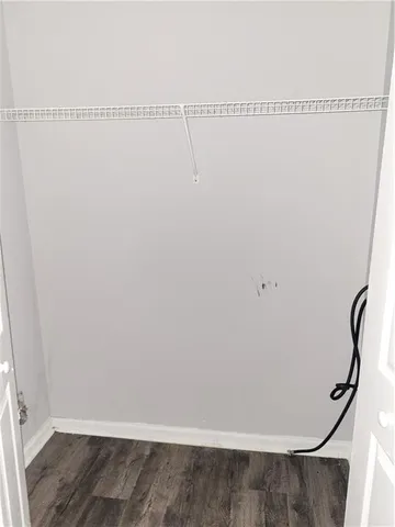 a view of small space with racks on the wall