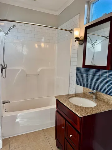 a bathroom with a sink and a bathtub