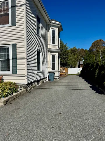 front view of a house with a street