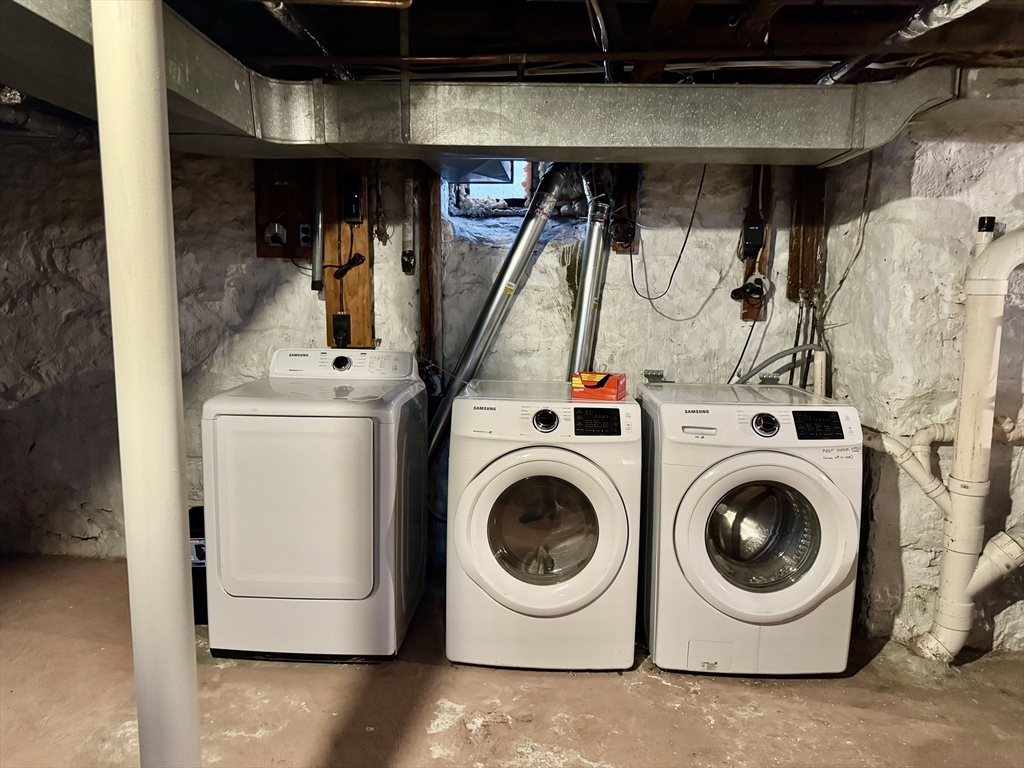 6 Gould Street, Unit 2 Stoneham, MA 02180 - Photo 26 of 27 a utility room with dryer and washer