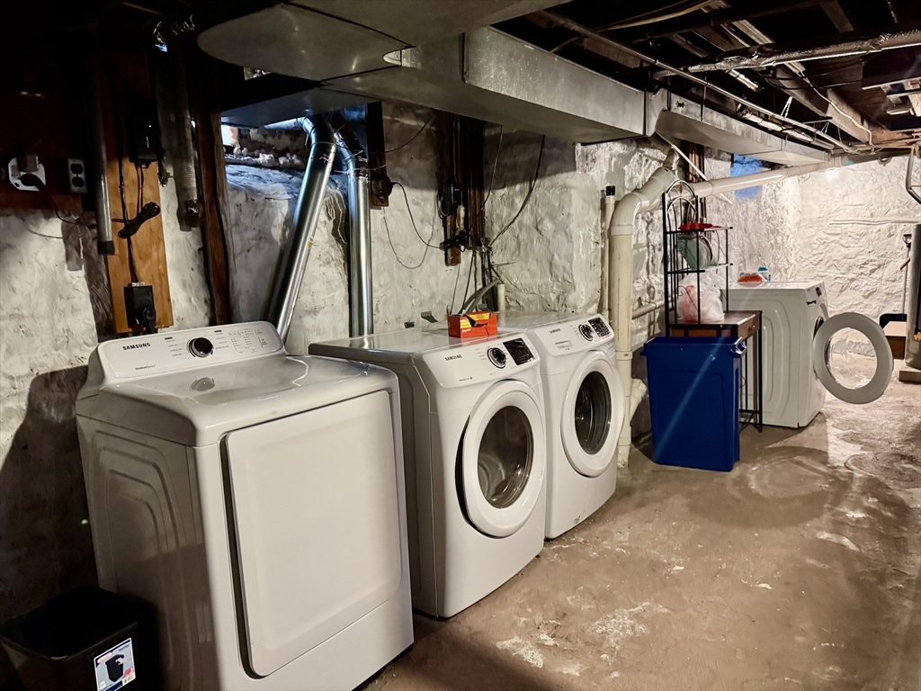 6 Gould Street, Unit 2 Stoneham, MA 02180 - Photo 27 of 27 a utility room with dryer and washer