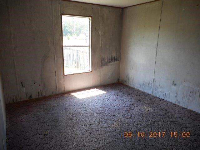 12 Whitening Road Butler, GA 31006 - Photo 11 of 12 an empty room with windows