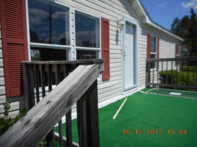 12 Whitening Road Butler, GA 31006 - Photo 12 of 12 a view of a house with backyard and porch