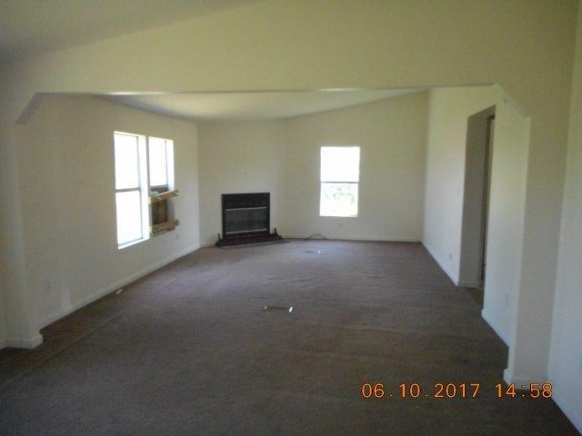 12 Whitening Road Butler, GA 31006 - Photo 6 of 12 a view of an empty room with a window