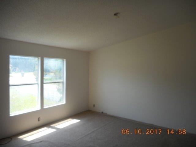 12 Whitening Road Butler, GA 31006 - Photo 9 of 12 an empty room with a window
