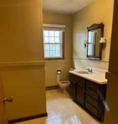 8707 Huber Road Belvidere, IL 61008 - Photo 11 of 13 a bathroom with a sink and a mirror