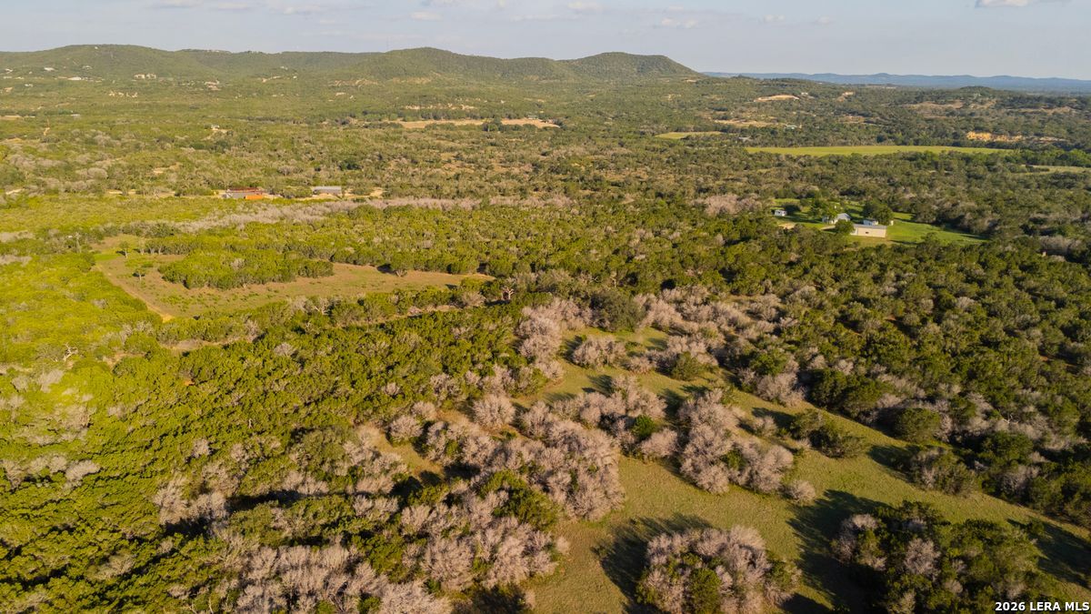 3584 Privilege Creek Road Pipe Creek, TX 78063 - Photo 15 of 44 a view of a city with an ocean