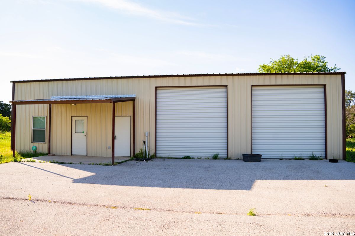 3584 Privilege Creek Road Pipe Creek, TX 78063 - Photo 2 of 44 a front view of a house