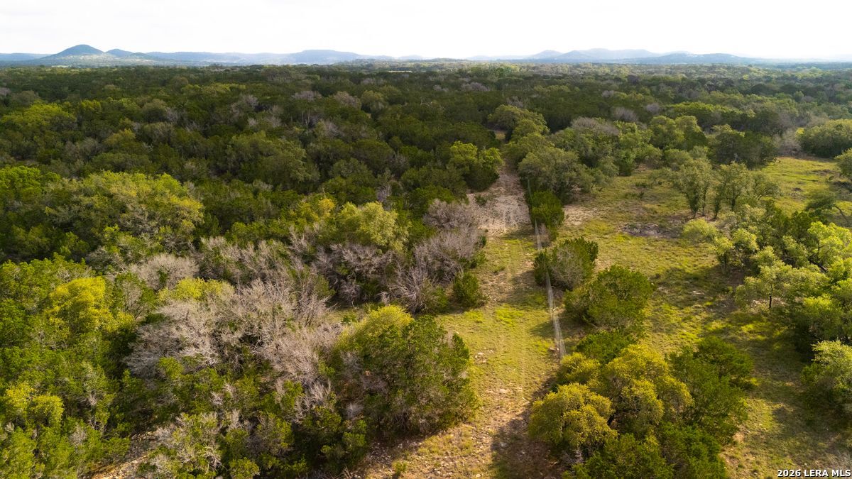 3584 Privilege Creek Road Pipe Creek, TX 78063 - Photo 5 of 44 a view of city and mountains