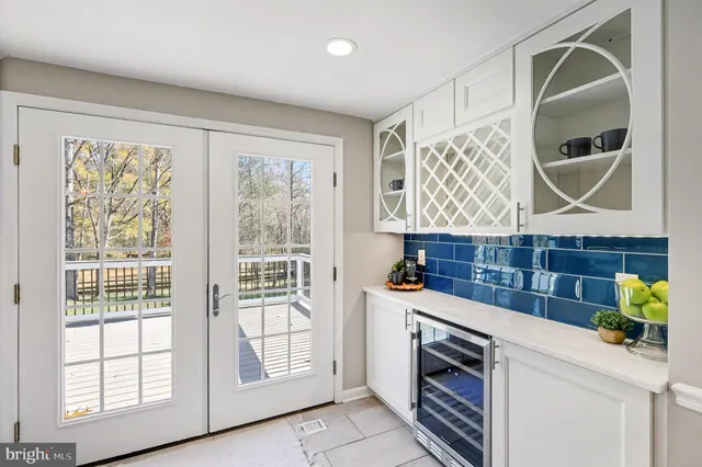 a kitchen with a wooden cabinets and a stove top oven