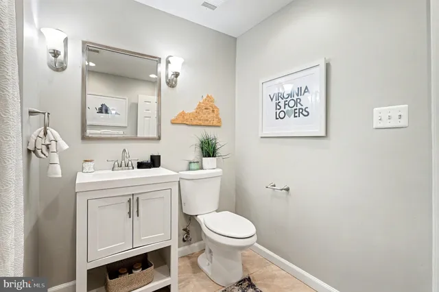 a view of a swimming pool with an outdoor seating