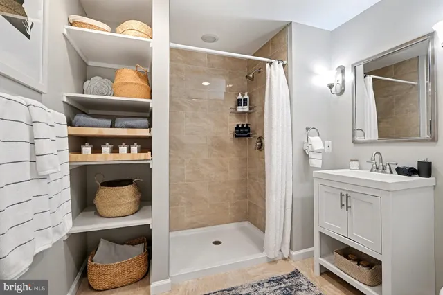 a view of a swimming pool with an outdoor space and seating area