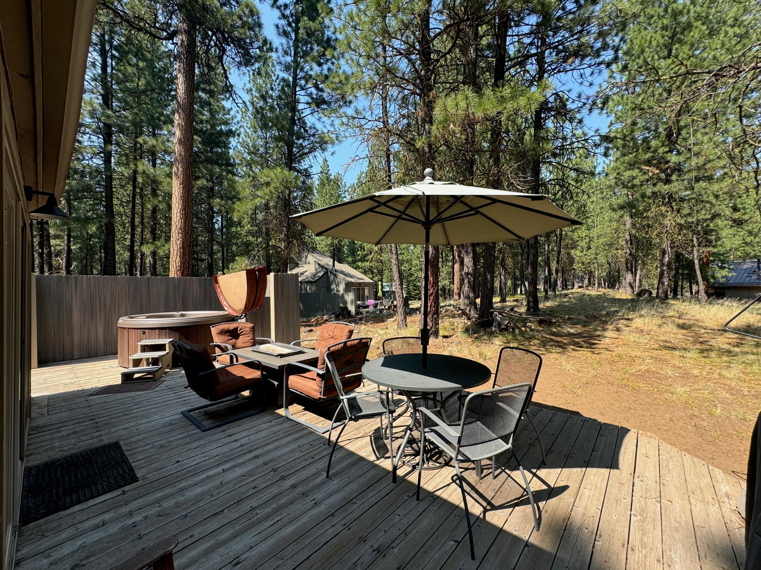 A large deck with hot tub
