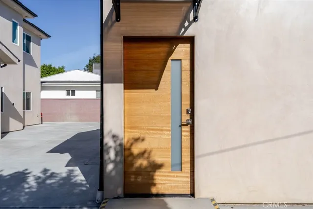 a view of a door front of the house