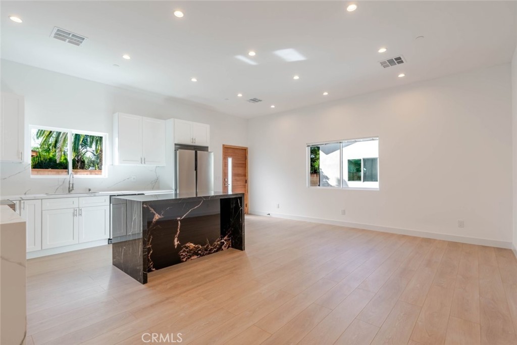 6852 Ranchito Avenue Van Nuys, CA 91405 - Photo 5 of 18 a view of kitchen and window with furniture