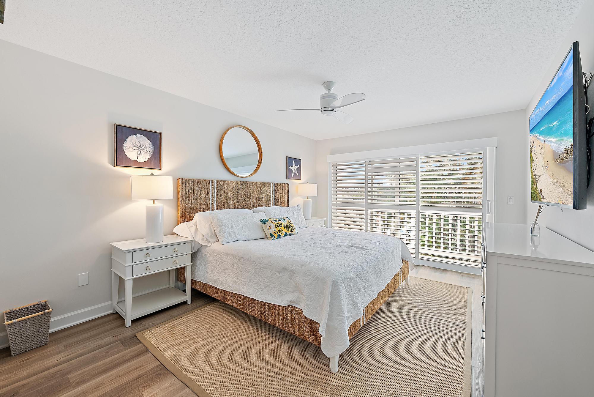 1000 North Us Highway, Unit 700 Jupiter, FL 33477 - Photo 22 of 32 a bedroom with a bed and a window