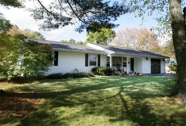 20 Ruthellen Road Framingham, MA 01701 - Photo 1 of 10 a front view of a house with a garden