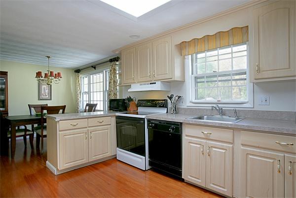 20 Ruthellen Road Framingham, MA 01701 - Photo 3 of 10 a kitchen with a sink stove and cabinets