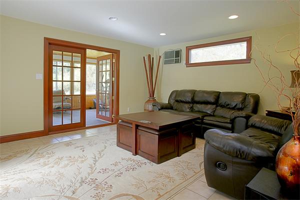 20 Ruthellen Road Framingham, MA 01701 - Photo 4 of 10 a living room with furniture and a flat screen tv