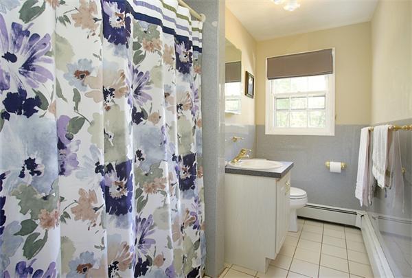 20 Ruthellen Road Framingham, MA 01701 - Photo 9 of 10 a bathroom with a shower and a toilet