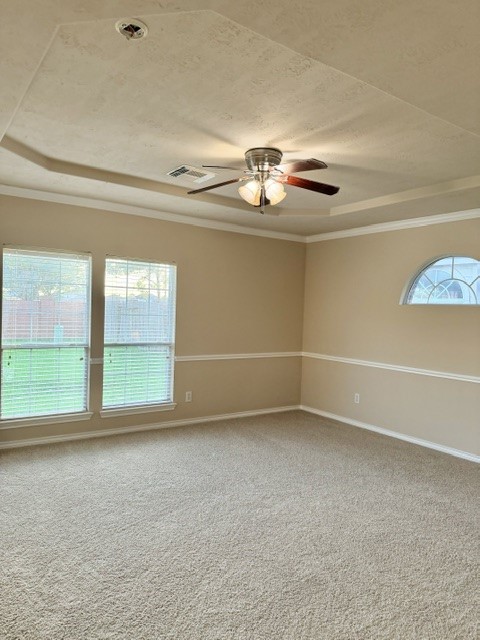 8531 Powell Ridge Drive Cypress, TX 77433 - Photo 11 of 19 Primary bedroom downstairs with tray ceiling