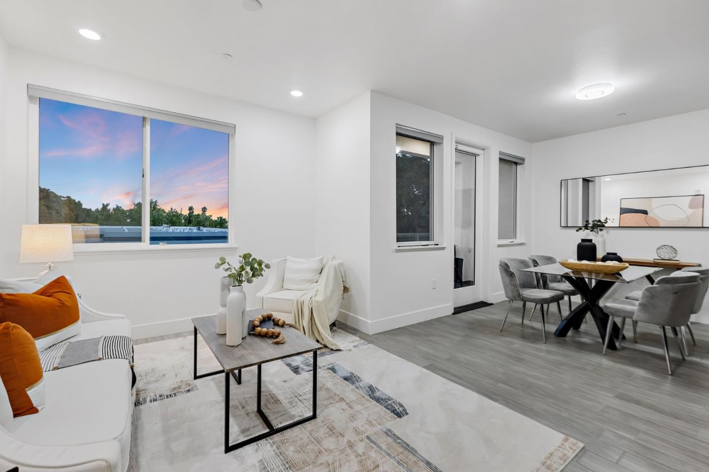 42111 Osgood Road, Unit 215 Fremont, CA 94539 - Photo 11 of 44 a living room with furniture a window and a table