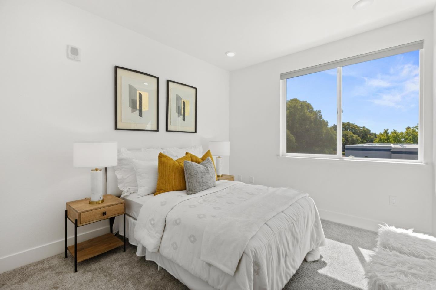 42111 Osgood Road, Unit 215 Fremont, CA 94539 - Photo 18 of 44 a bedroom with a bed and a window