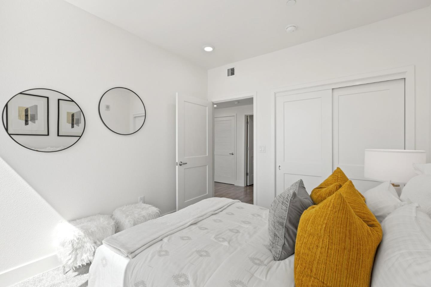 42111 Osgood Road, Unit 215 Fremont, CA 94539 - Photo 19 of 44 a bedroom with a bed and a closet in it