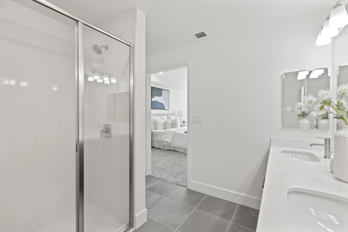 42111 Osgood Road, Unit 215 Fremont, CA 94539 - Photo 24 of 44 a bathroom with a sink and mirror