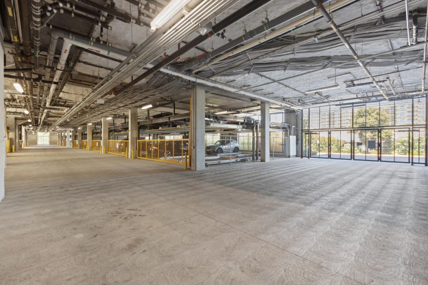 42111 Osgood Road, Unit 215 Fremont, CA 94539 - Photo 30 of 44 a view of an empty room with a garage
