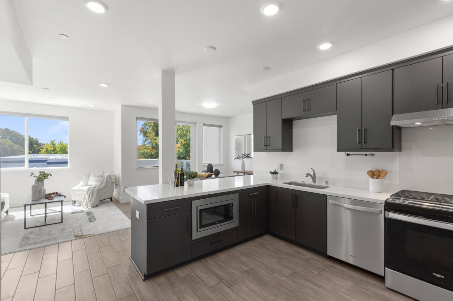 42111 Osgood Road, Unit 215 Fremont, CA 94539 - Photo 4 of 44 a kitchen with lots of counter space a sink and appliances