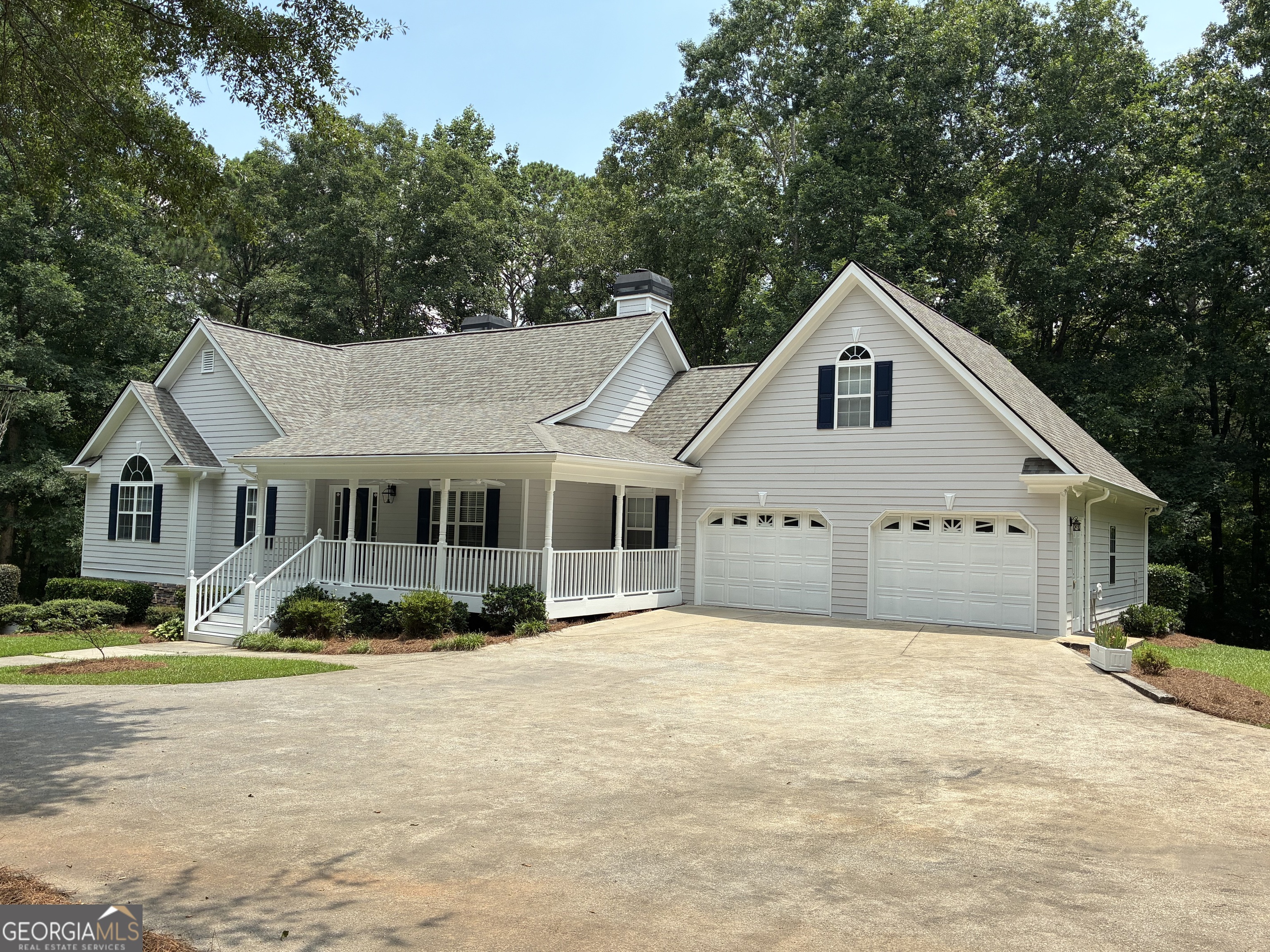 4580 Liberty Road Villa Rica, GA 30180 - Photo 1 of 67 rockin chair front porch / main level garage view