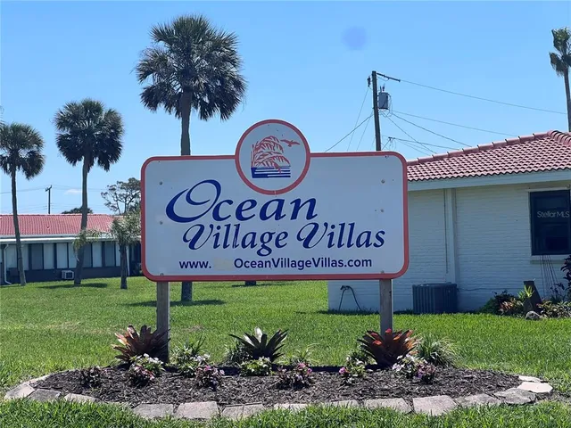 a view of outdoor space with garden and trees