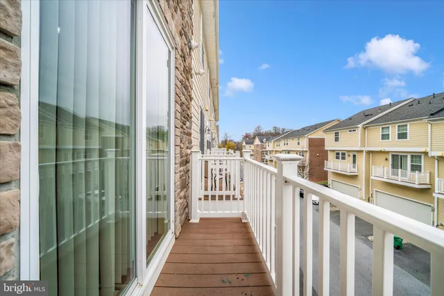a view of a balcony with city view
