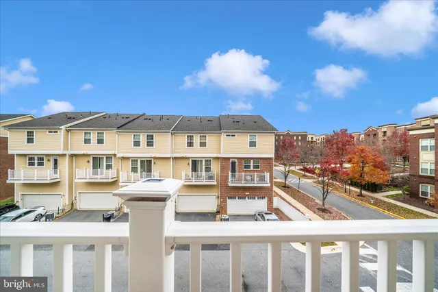 a view of a city that has tall buildings and a street