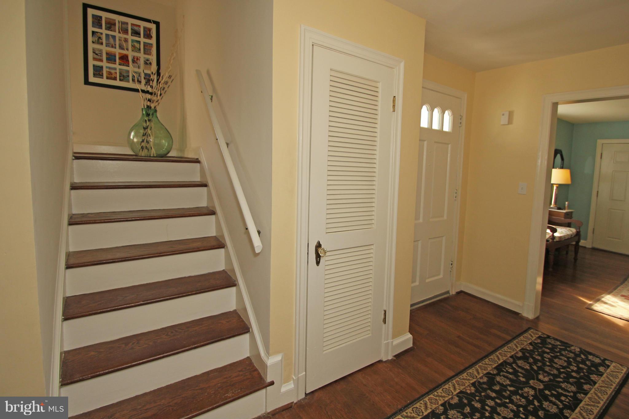 10314 Naglee Road Silver Spring, MD 20903 - Photo 2 of 30 a view of a hallway with wooden floor and entryway