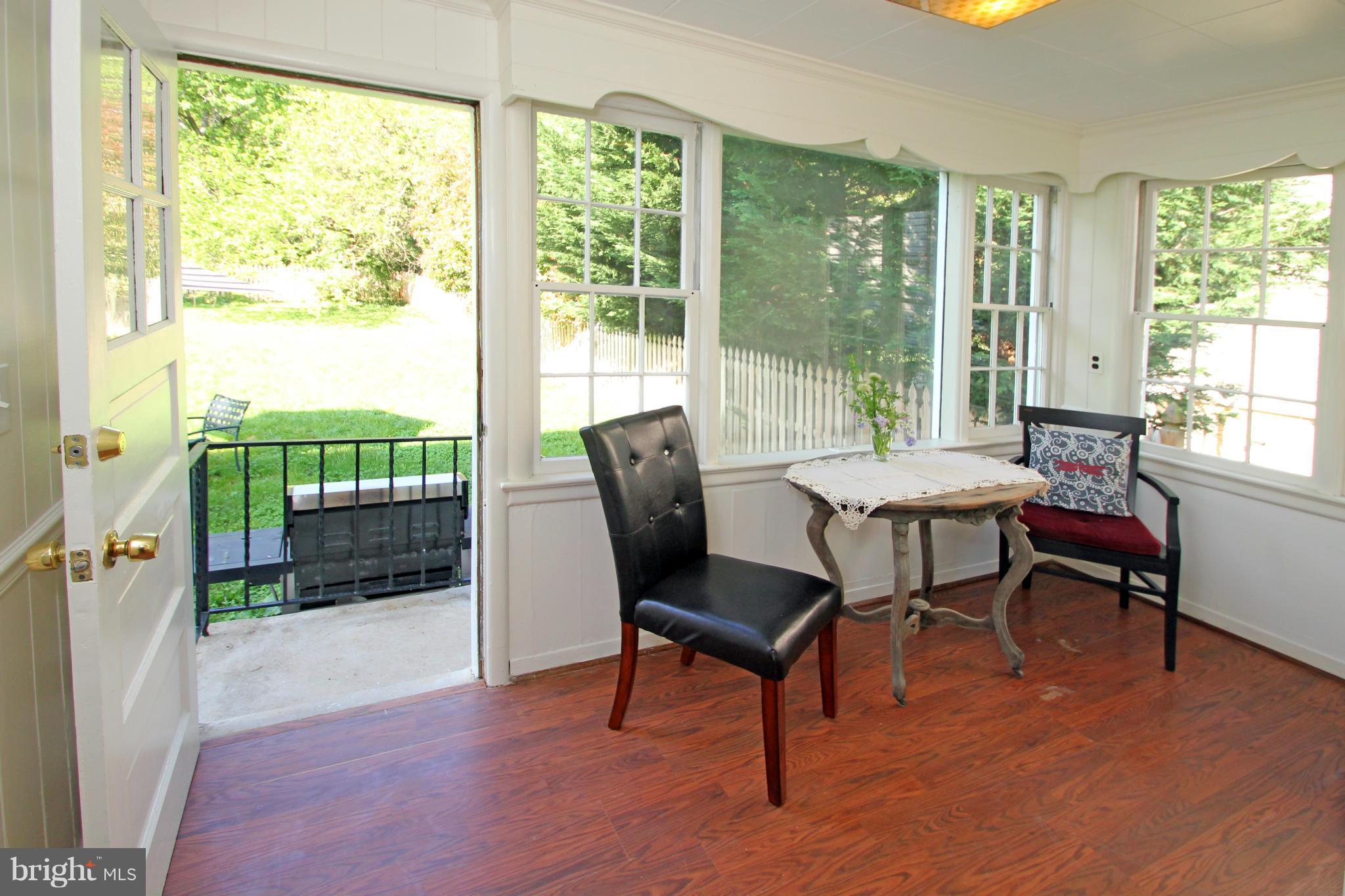10314 Naglee Road Silver Spring, MD 20903 - Photo 12 of 30 a outdoor living space with furniture and garden view