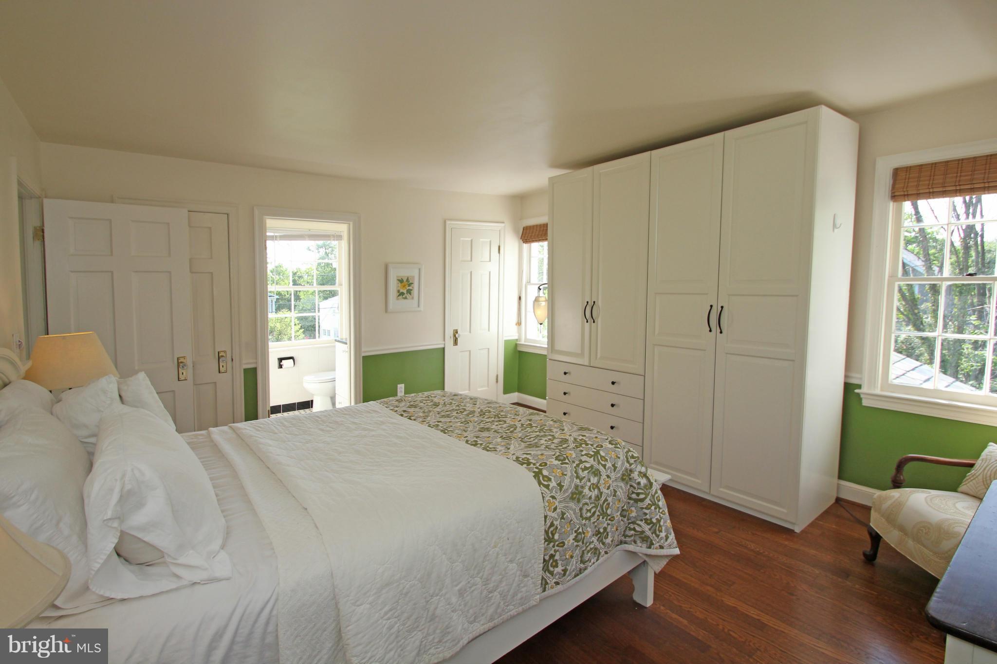 10314 Naglee Road Silver Spring, MD 20903 - Photo 17 of 30 a bedroom with a bed and a window