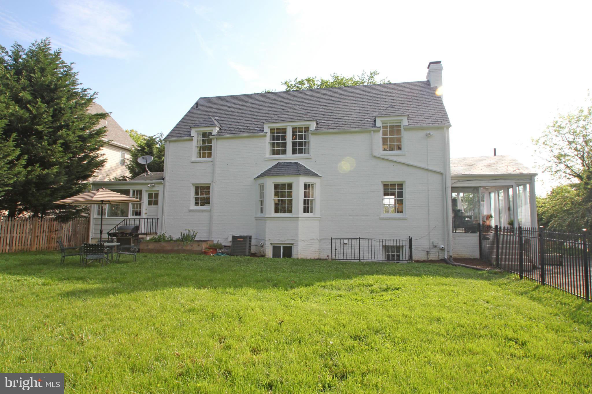 10314 Naglee Road Silver Spring, MD 20903 - Photo 27 of 30 a front view of a house with a yard