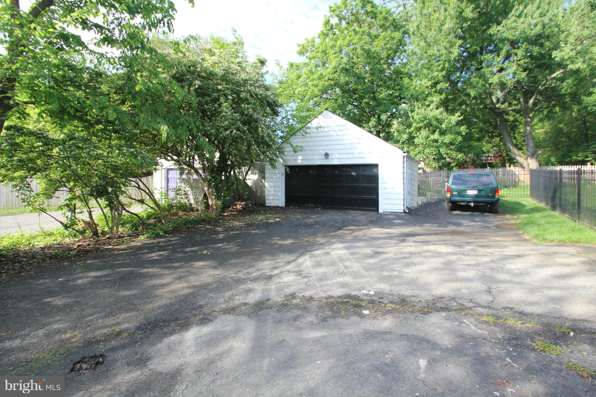 10314 Naglee Road Silver Spring, MD 20903 - Photo 29 of 30 a view of a house with a yard