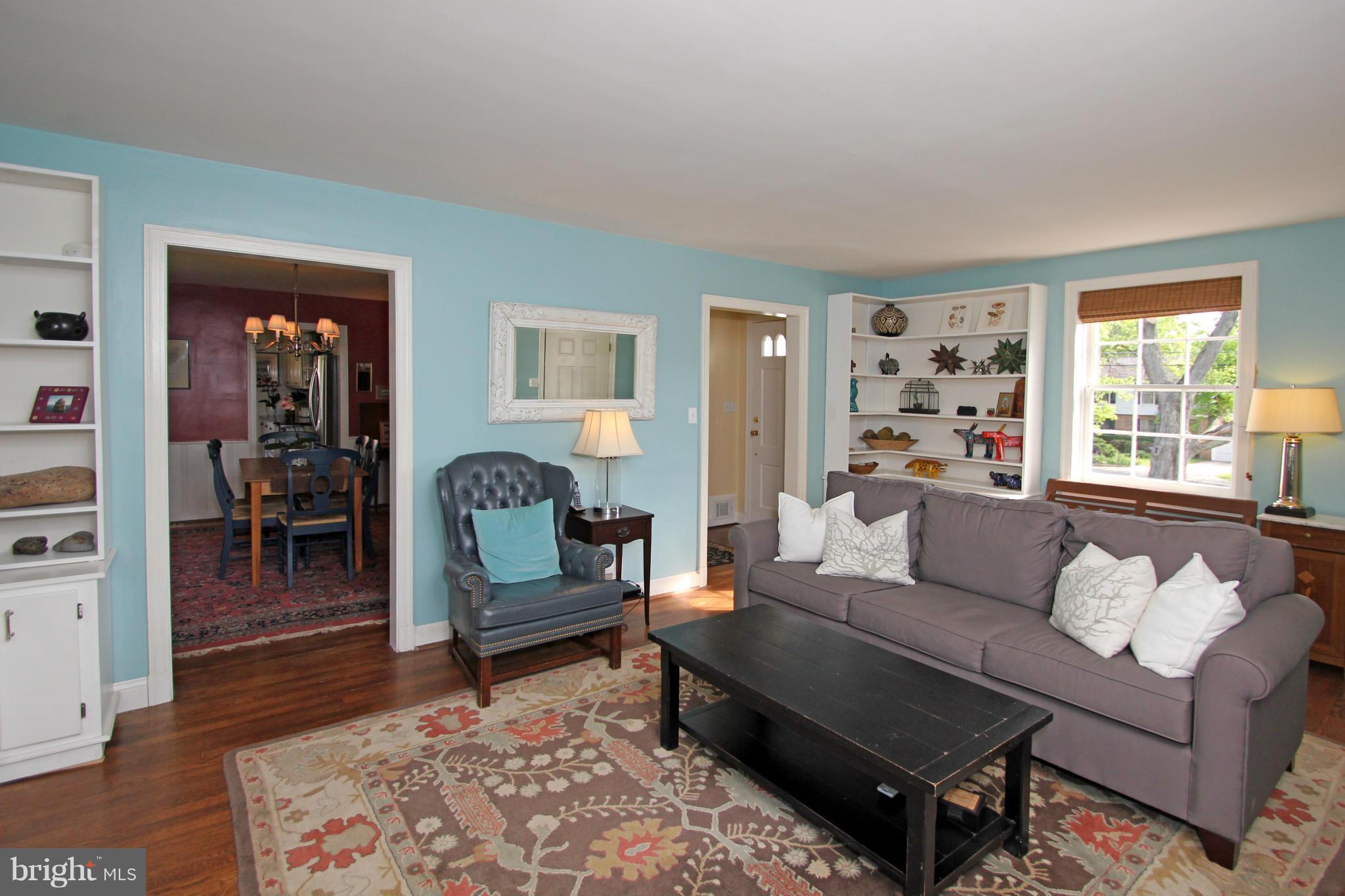 10314 Naglee Road Silver Spring, MD 20903 - Photo 5 of 30 a living room with furniture and wooden floor