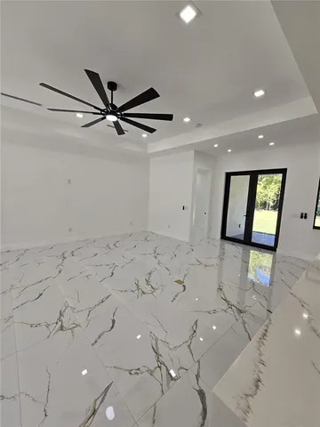 an entryway and livingroom view