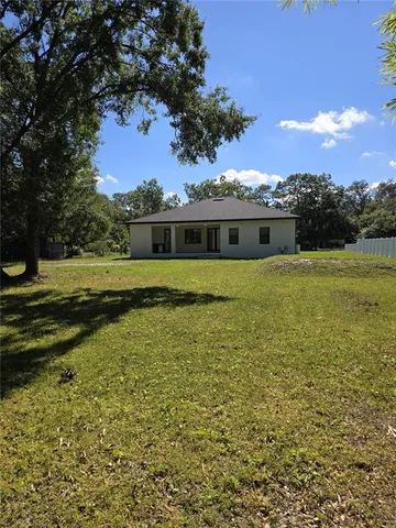 a house view with a garden space
